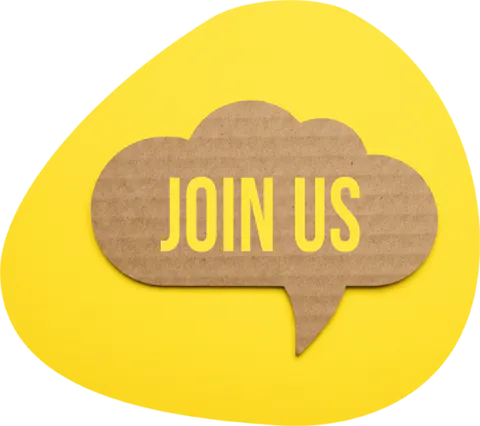 A cardboard speech bubble reading Join us.