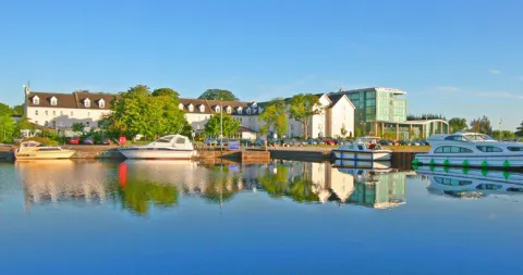 The Hodson Bay Hotel reflected in the lake