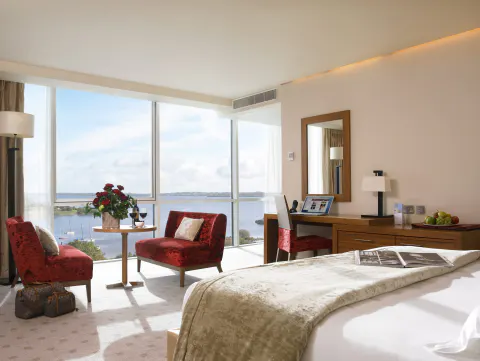 A guest room with a view over the lake